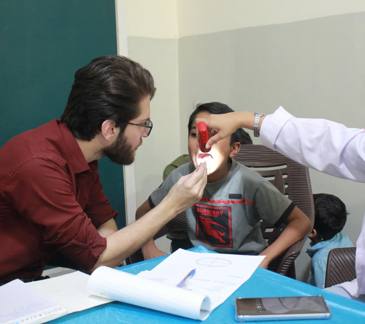 Donate to Orphanage Lahore - Baqiatullah Foundation Pakistan resident children receiving healthcare and home shelter