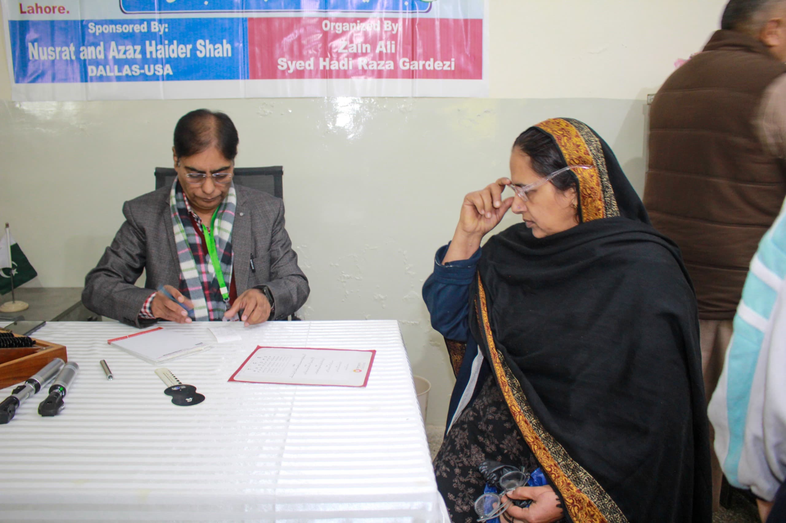 Medical volunteers conducting health screenings for children at Baqiatullah Foundation orphanage