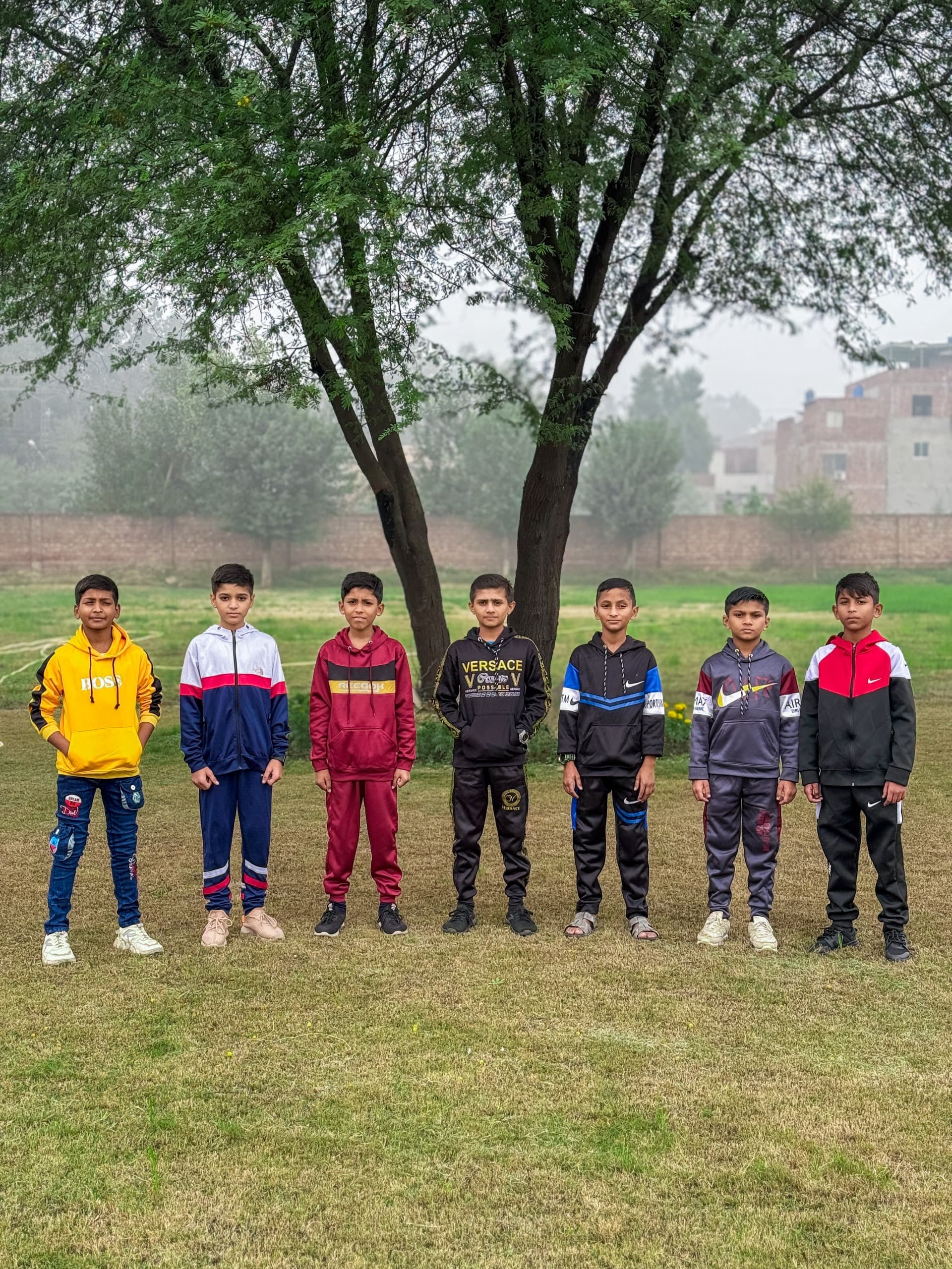 Children choosing festive Eid attire at Baqiatullah Foundation clothing distribution